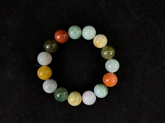 Multicolored beaded bracelet on a black background