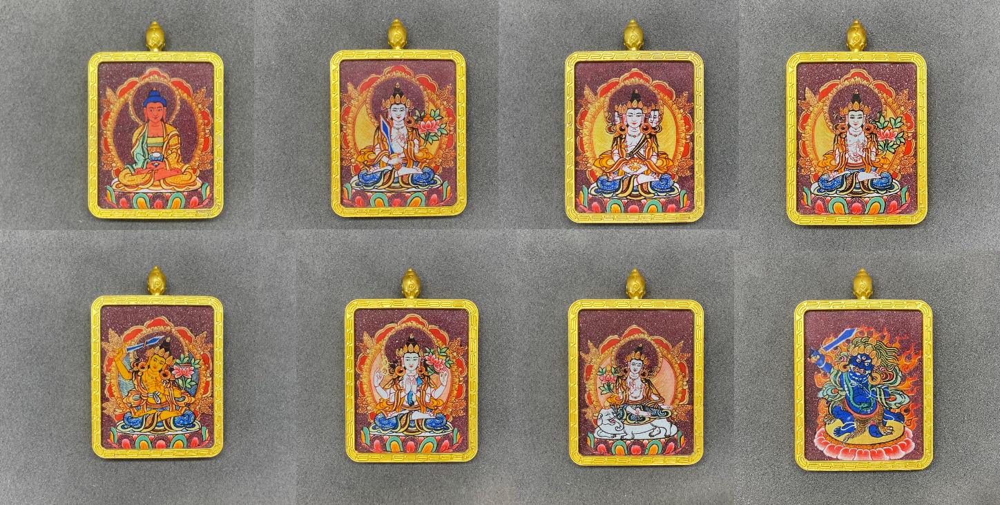 Eight golden Gawu box Thangkas are neatly arranged for display.