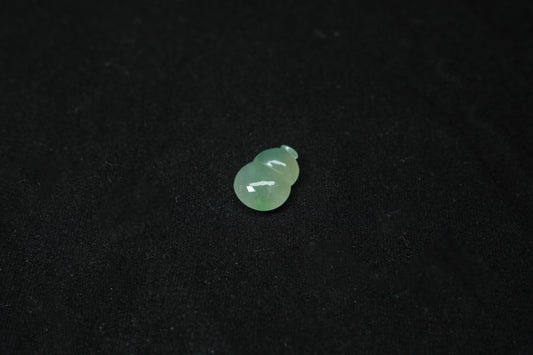 Green gemstone on a black background