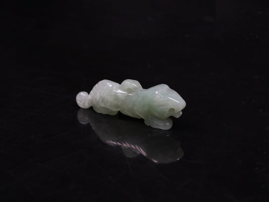 A vivacious misty green tiger loose jadeite.