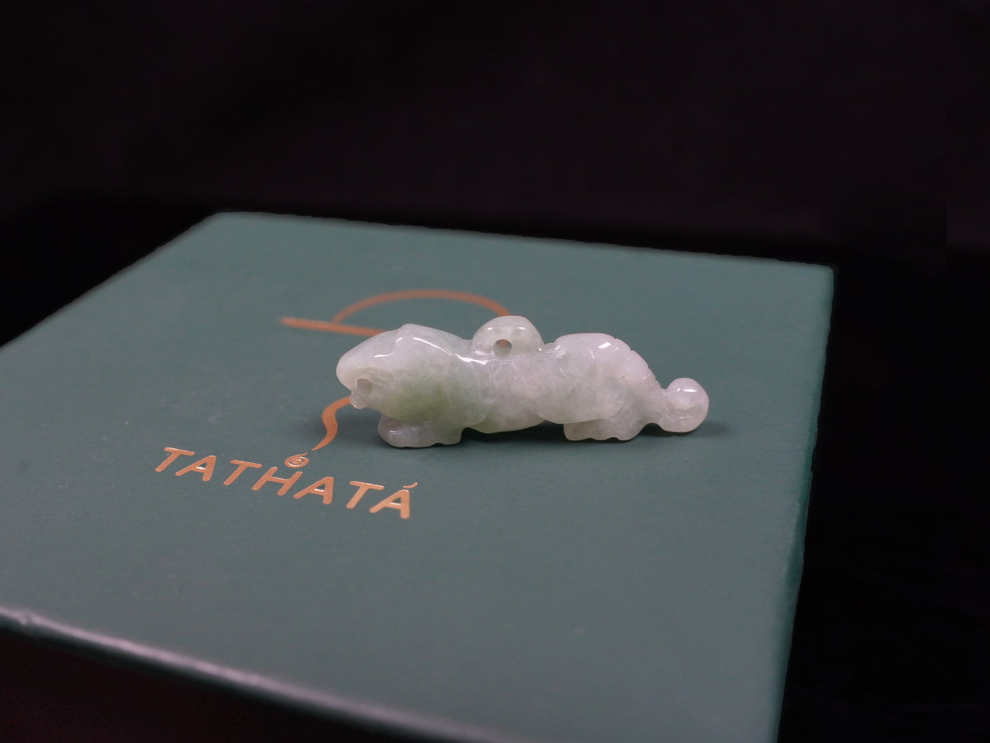 A vivacious misty green tiger loose jadeite.