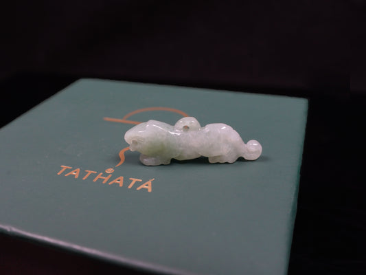 A vivacious misty green tiger loose jadeite.