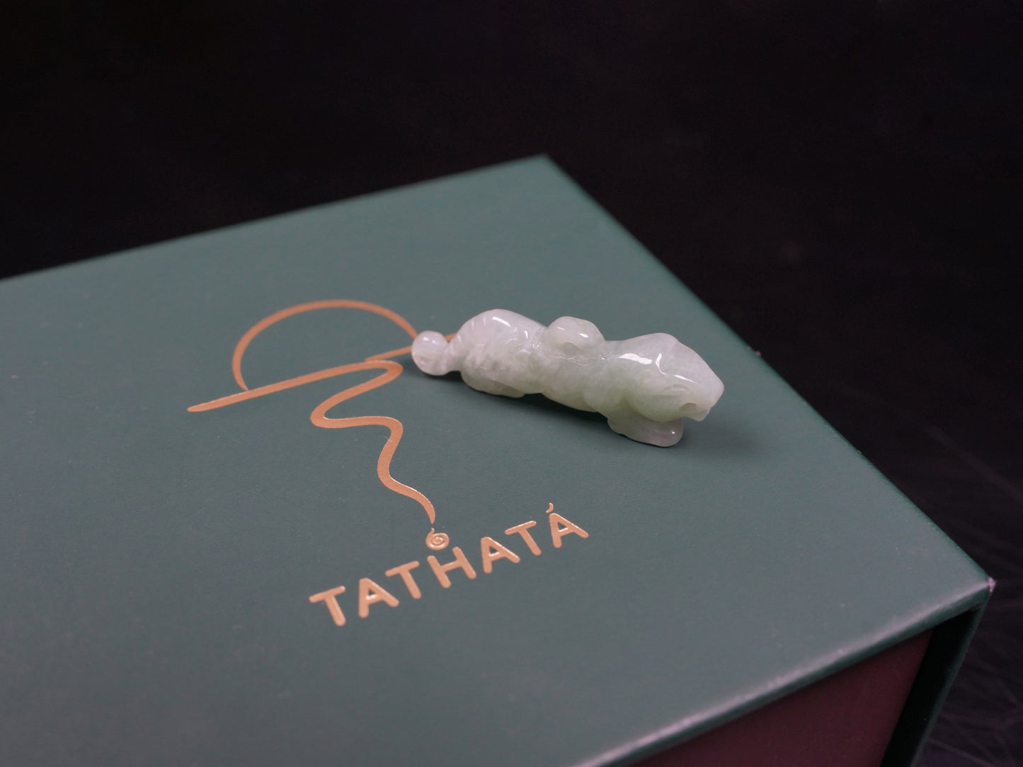 A vivacious misty green tiger loose jadeite.