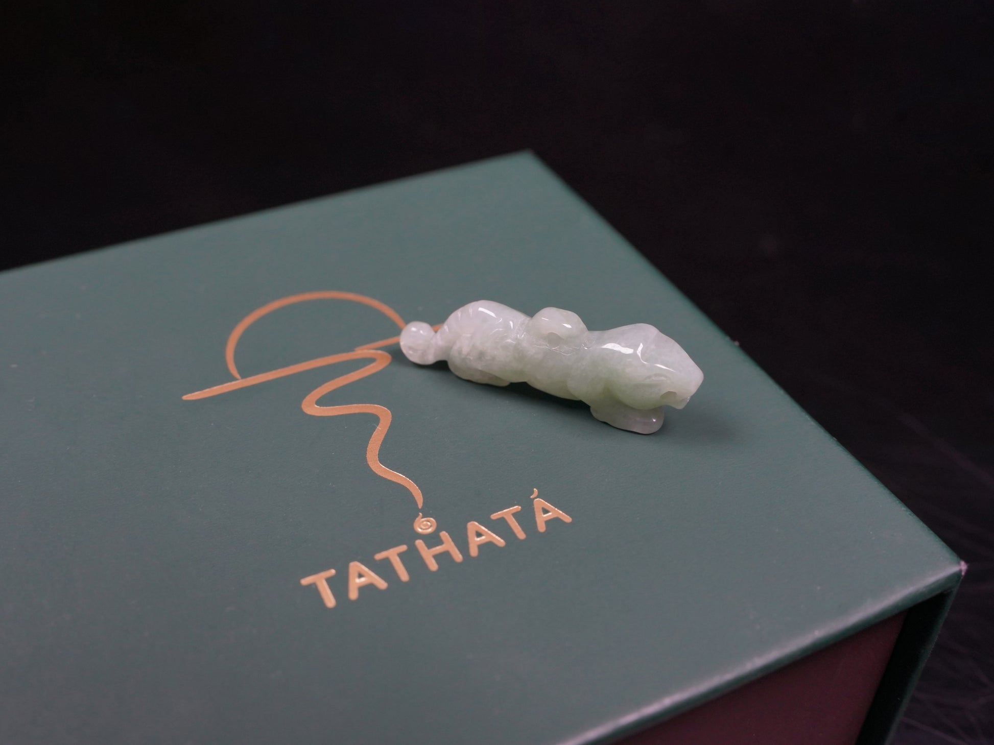 A vivacious misty green tiger loose jadeite.