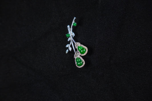 Jewelry with green stones on a black background