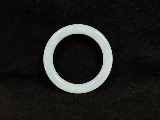 A white ice jadeite bangle.