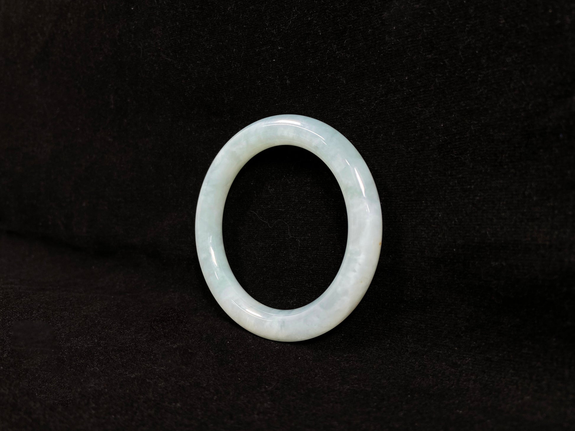 A white ice jadeite bangle.