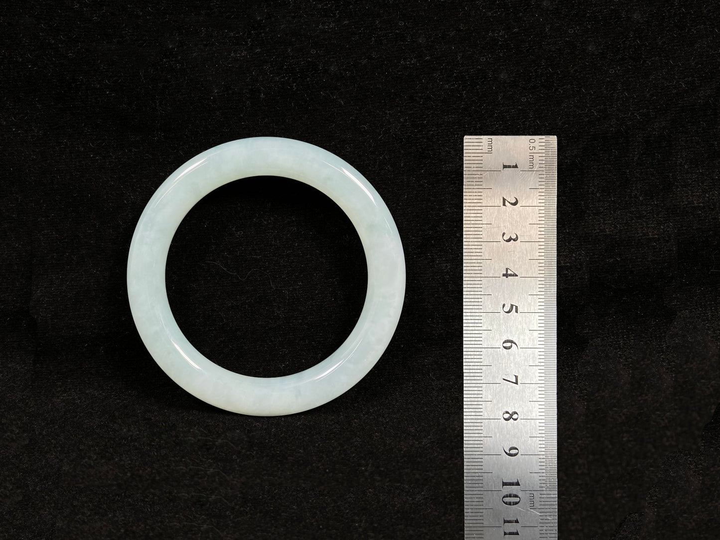 A white ice jadeite bangle.
