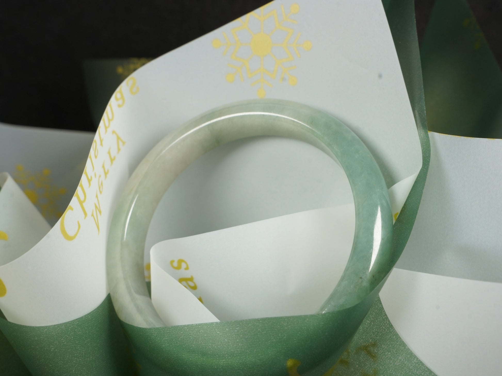 A mist green gentle luster jadeite bangle.