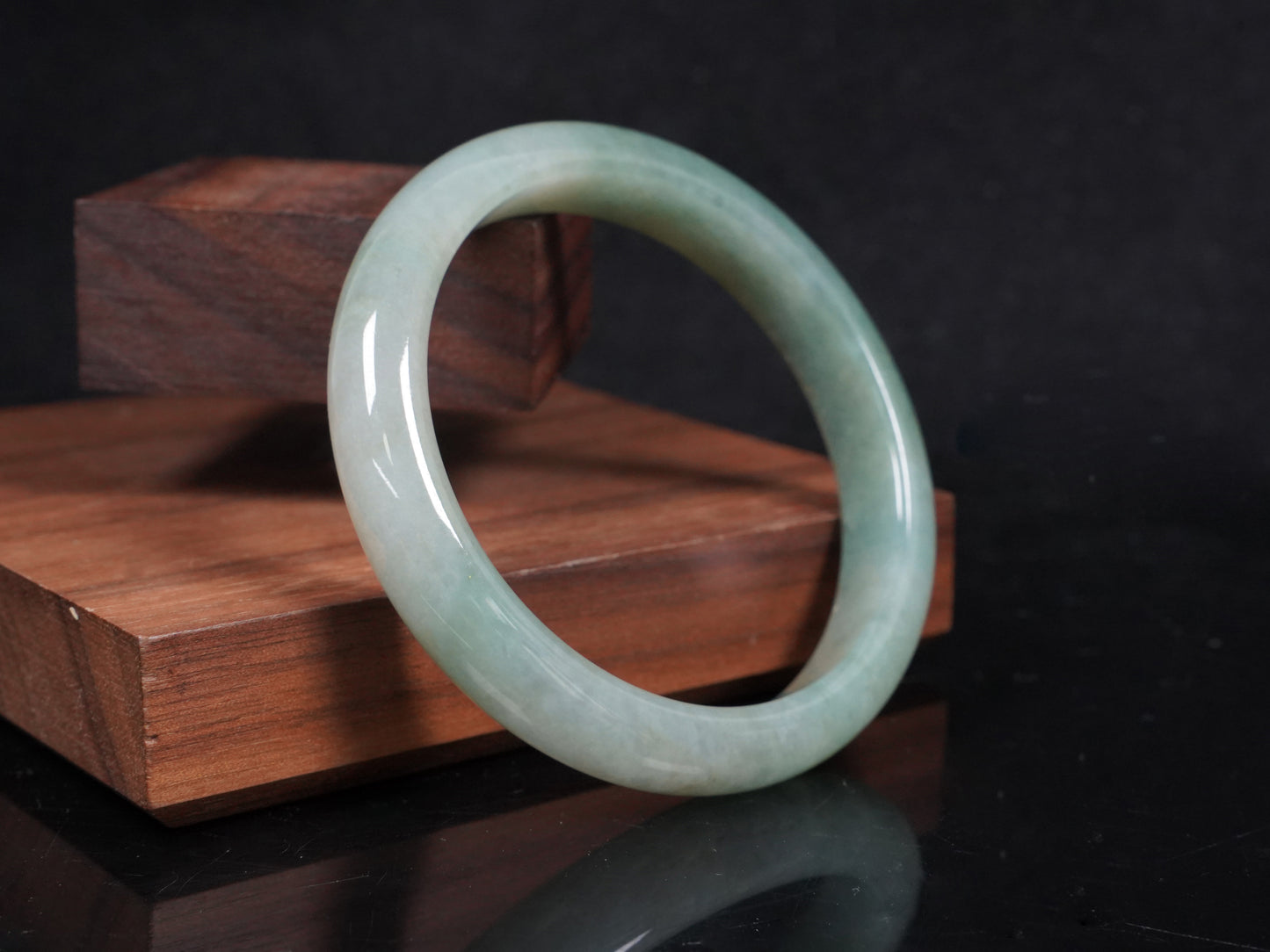 A mist green gentle luster jadeite bangle.