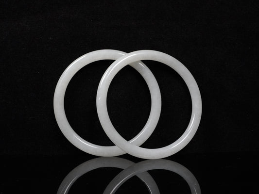 A pure white cloud pair jadeite bangle.