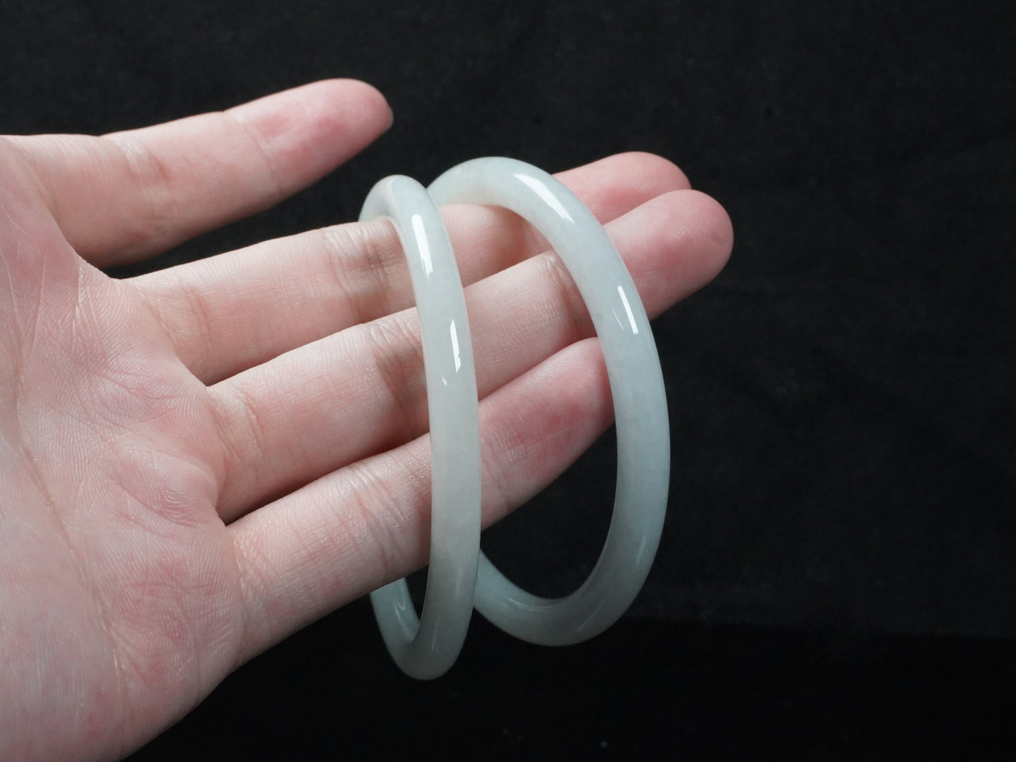 A pure white cloud pair jadeite bangle.