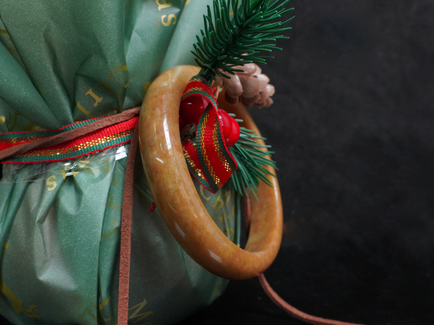  A auburn tinged golden caramel jadeite bangle.