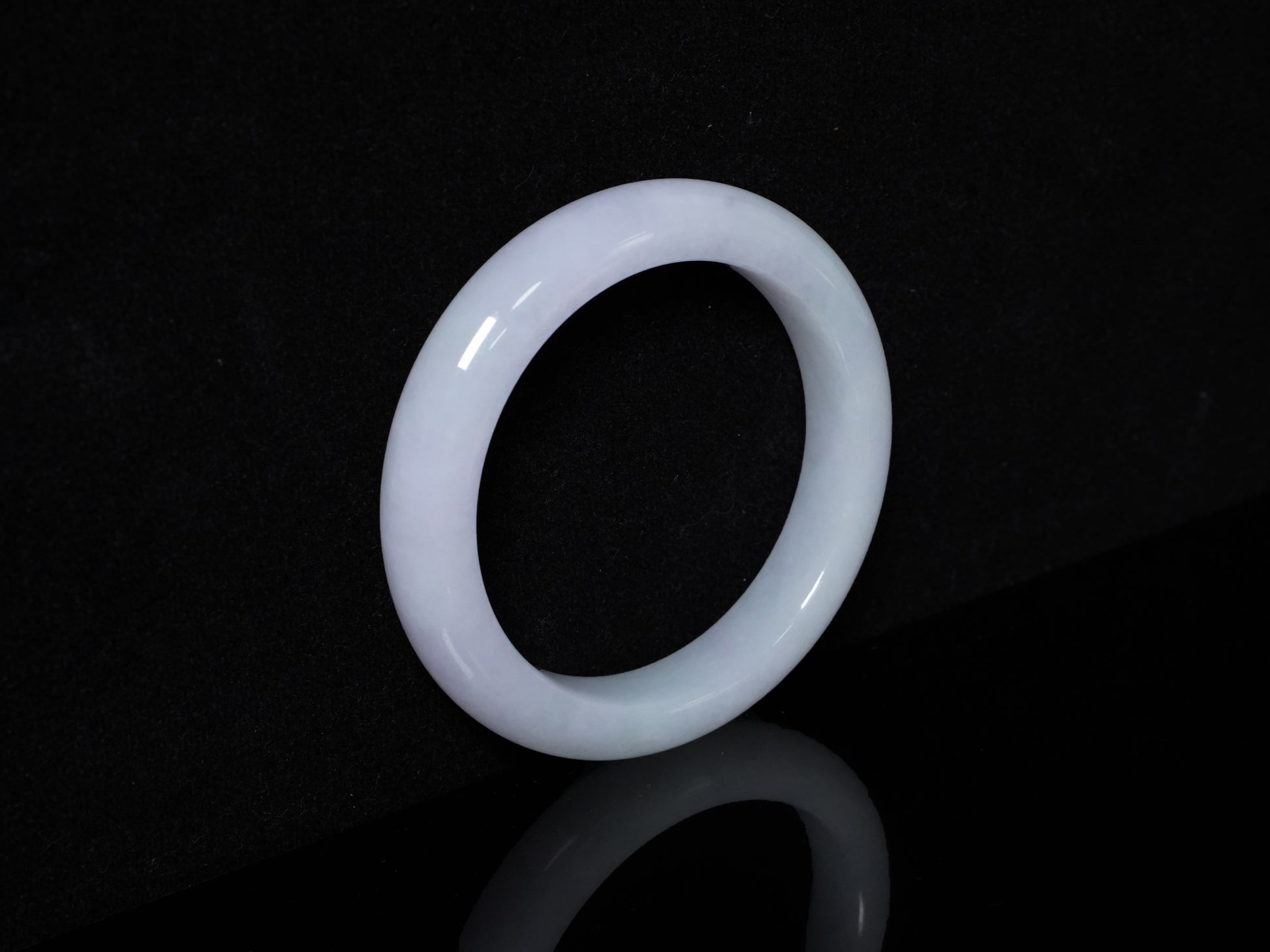 A soft lavender white bangle.