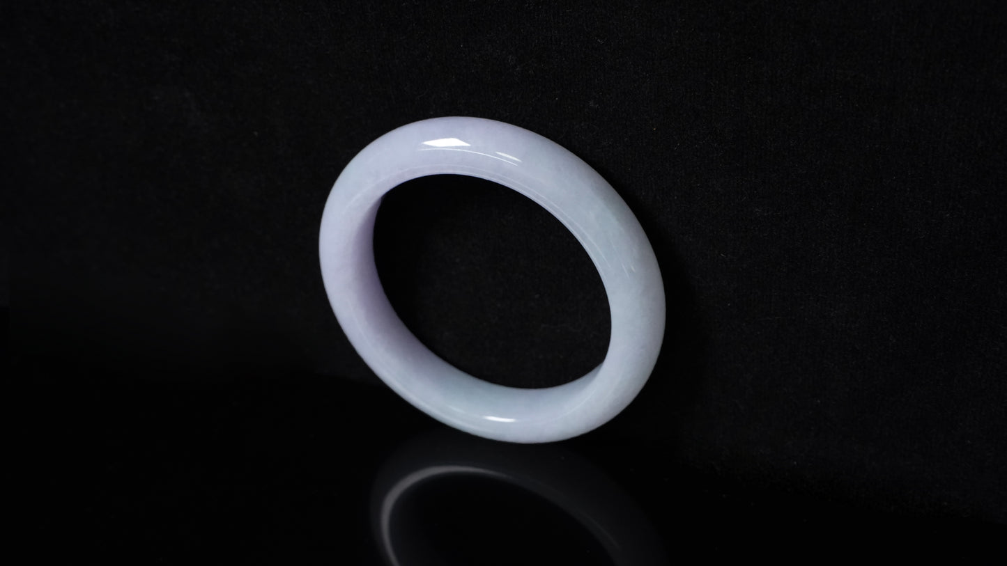 A soft lavender white bangle.