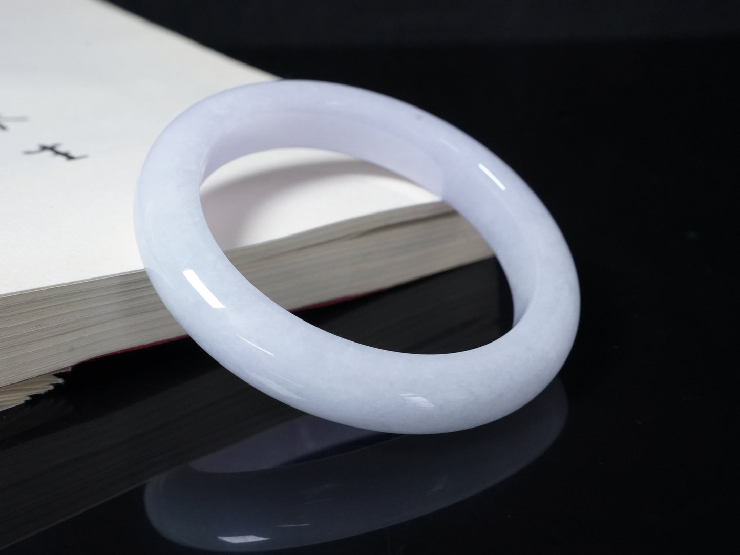 A soft lavender white bangle.