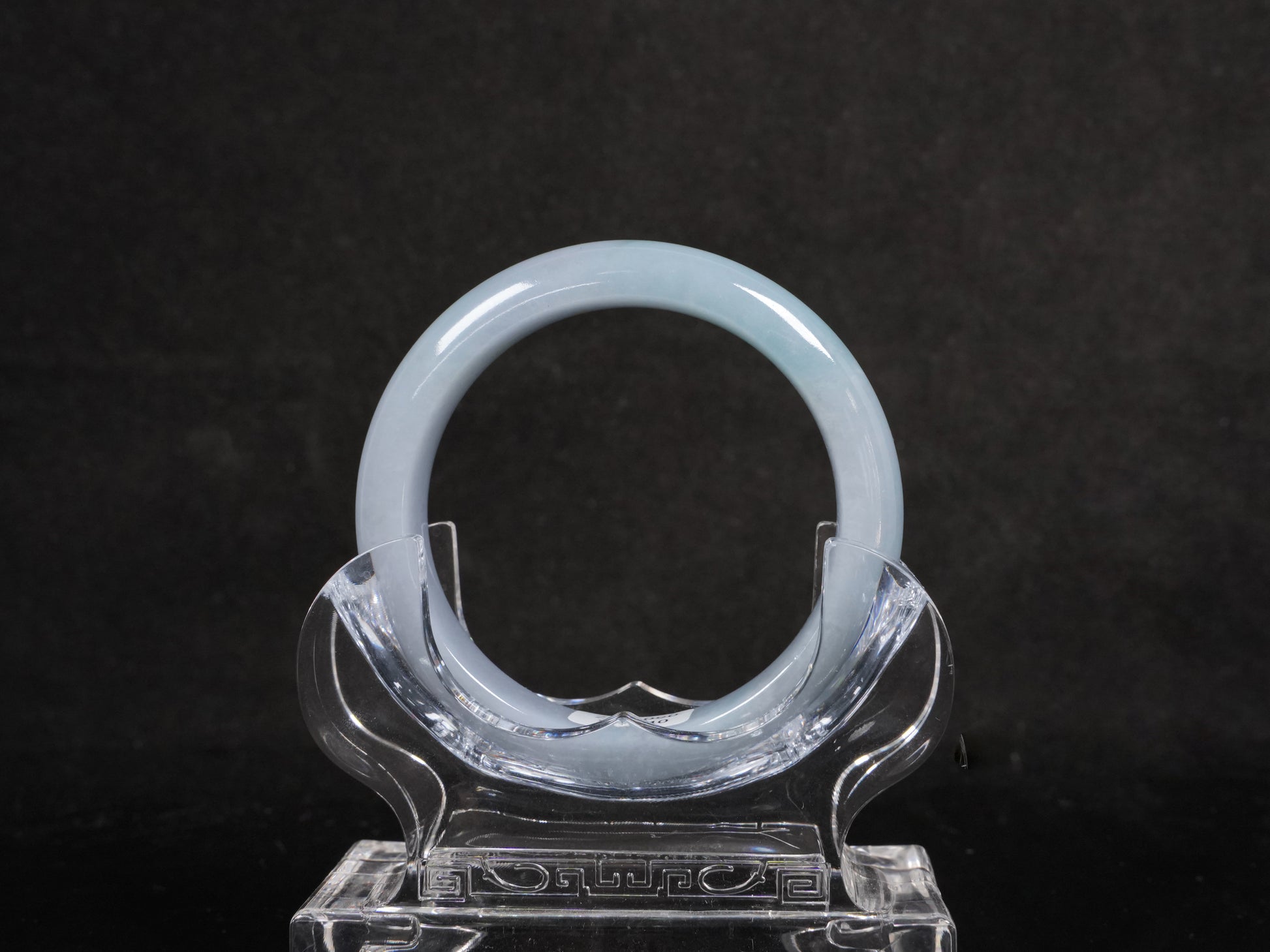 A misty green white jadeite bangle.