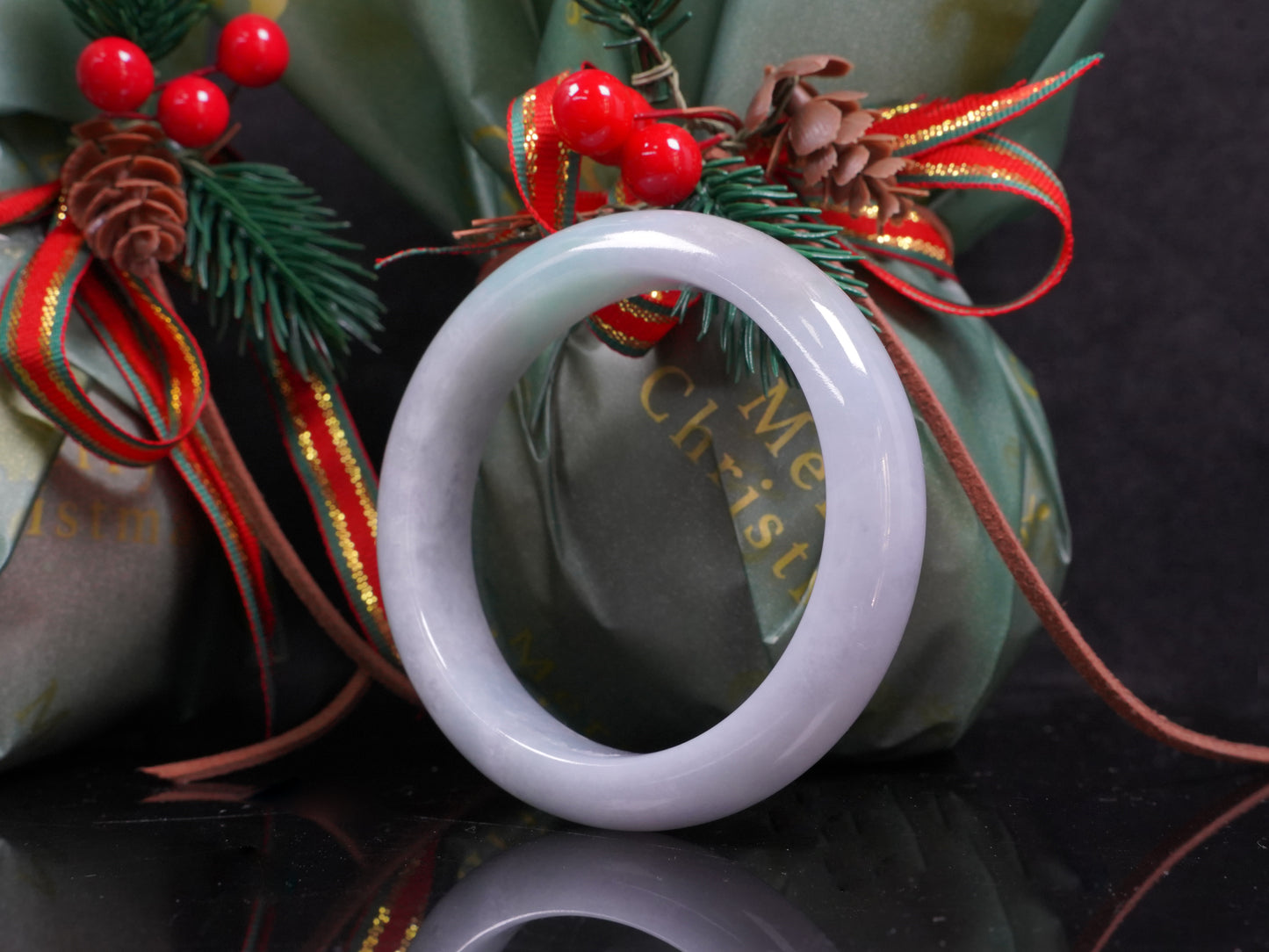 A misty green white jadeite bangle.