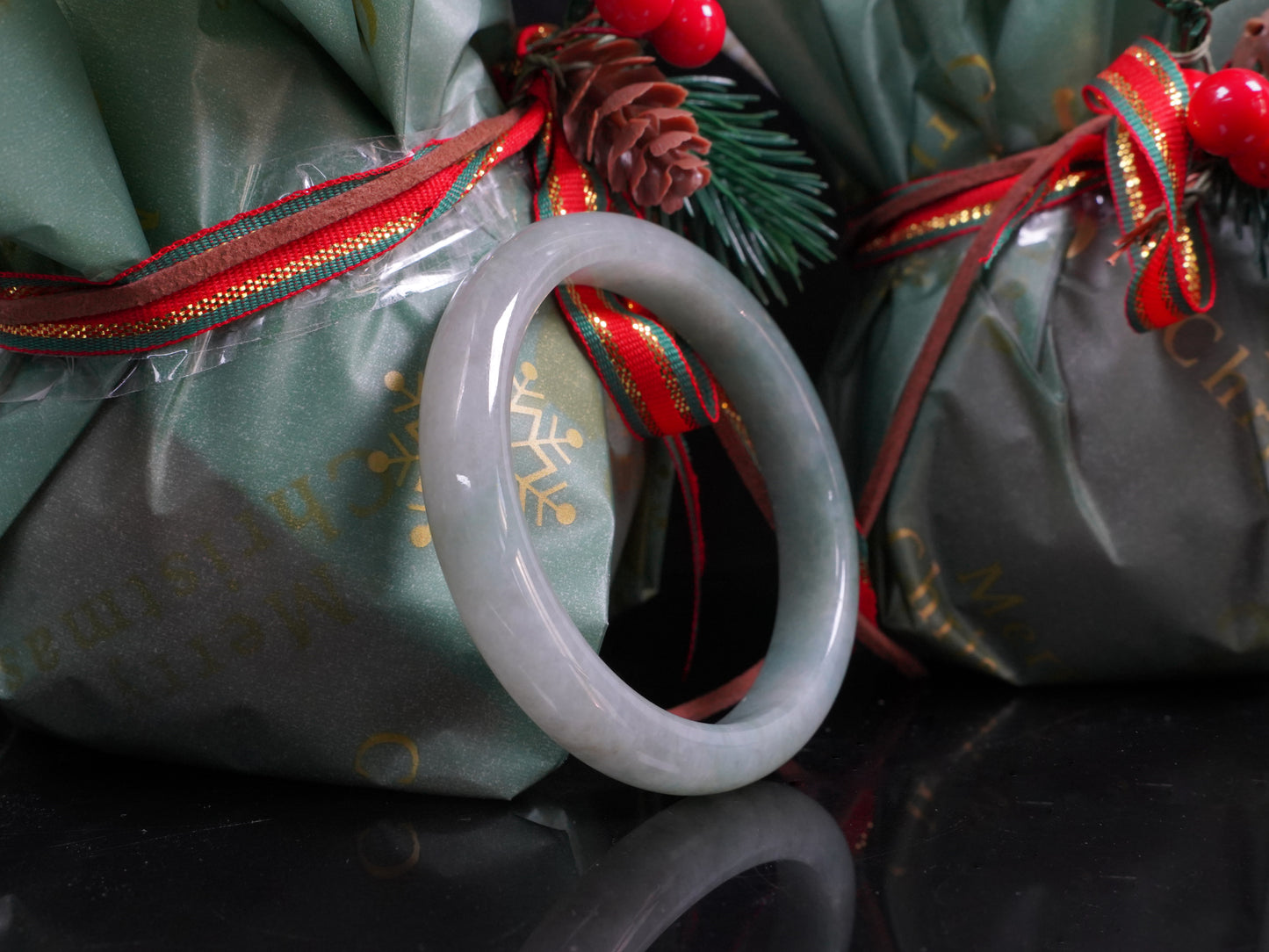 A misty green white jadeite bangle.