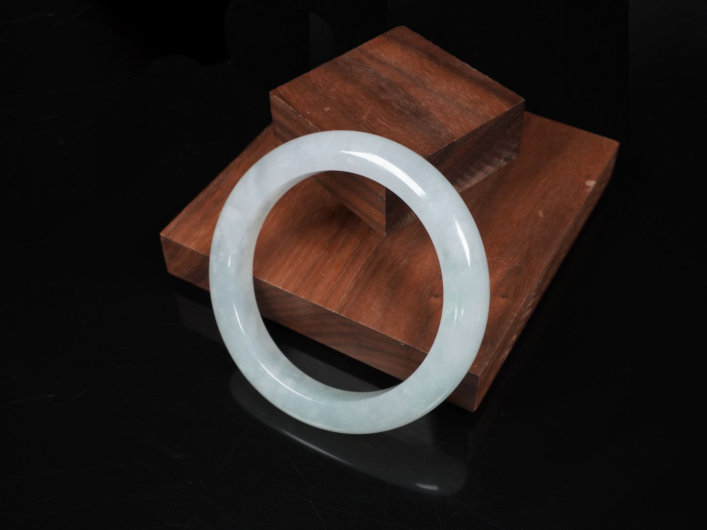 A milky white-hued jadeite bangle.