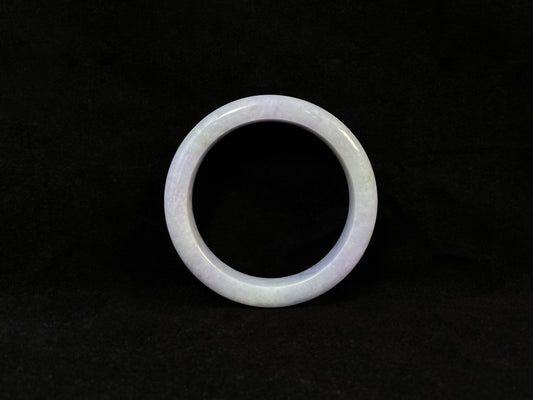 A delicate lavender jade bangle.
