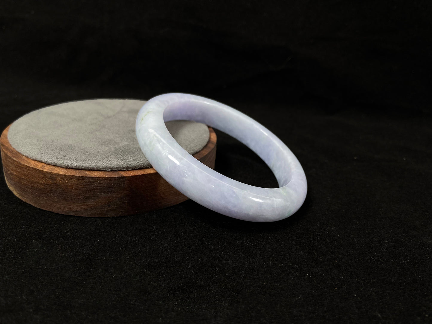 A delicate lavender jade bangle.
