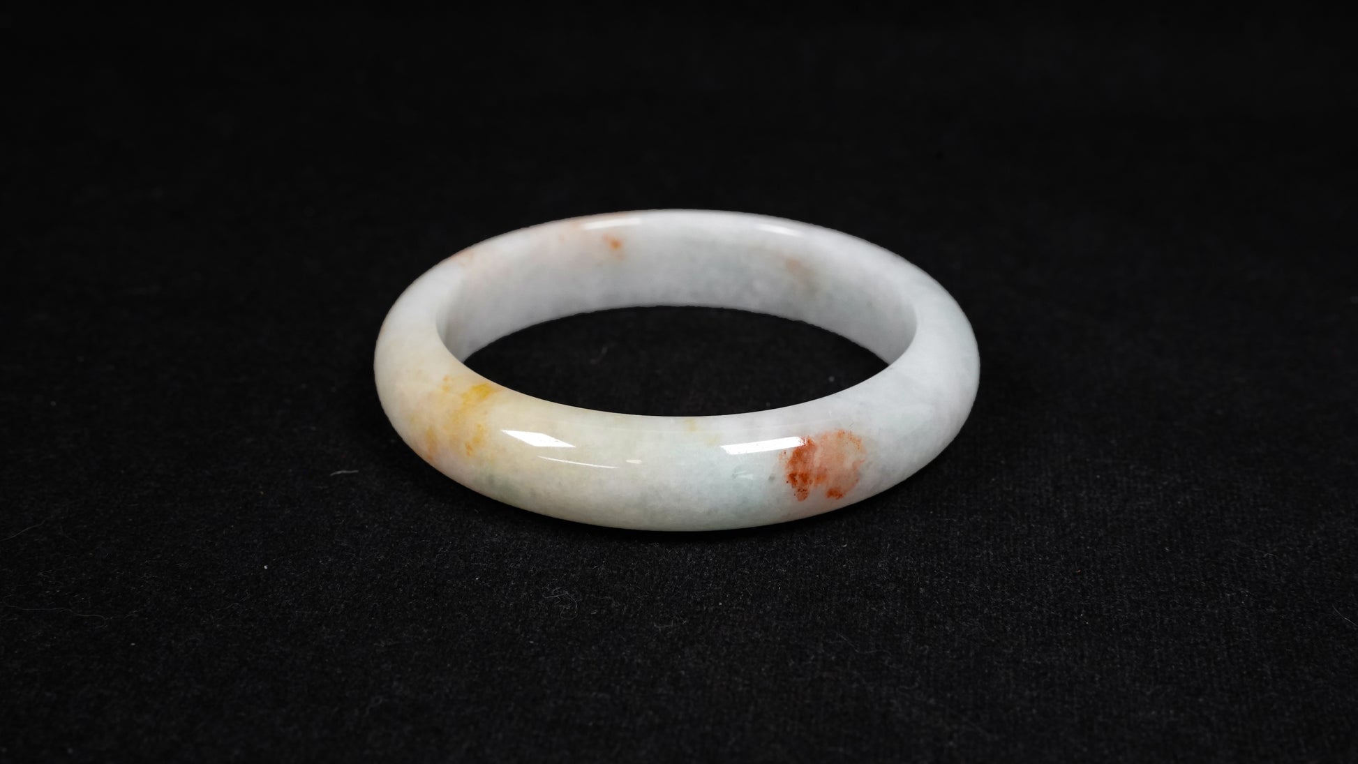 Tri-color jadeite bangle.