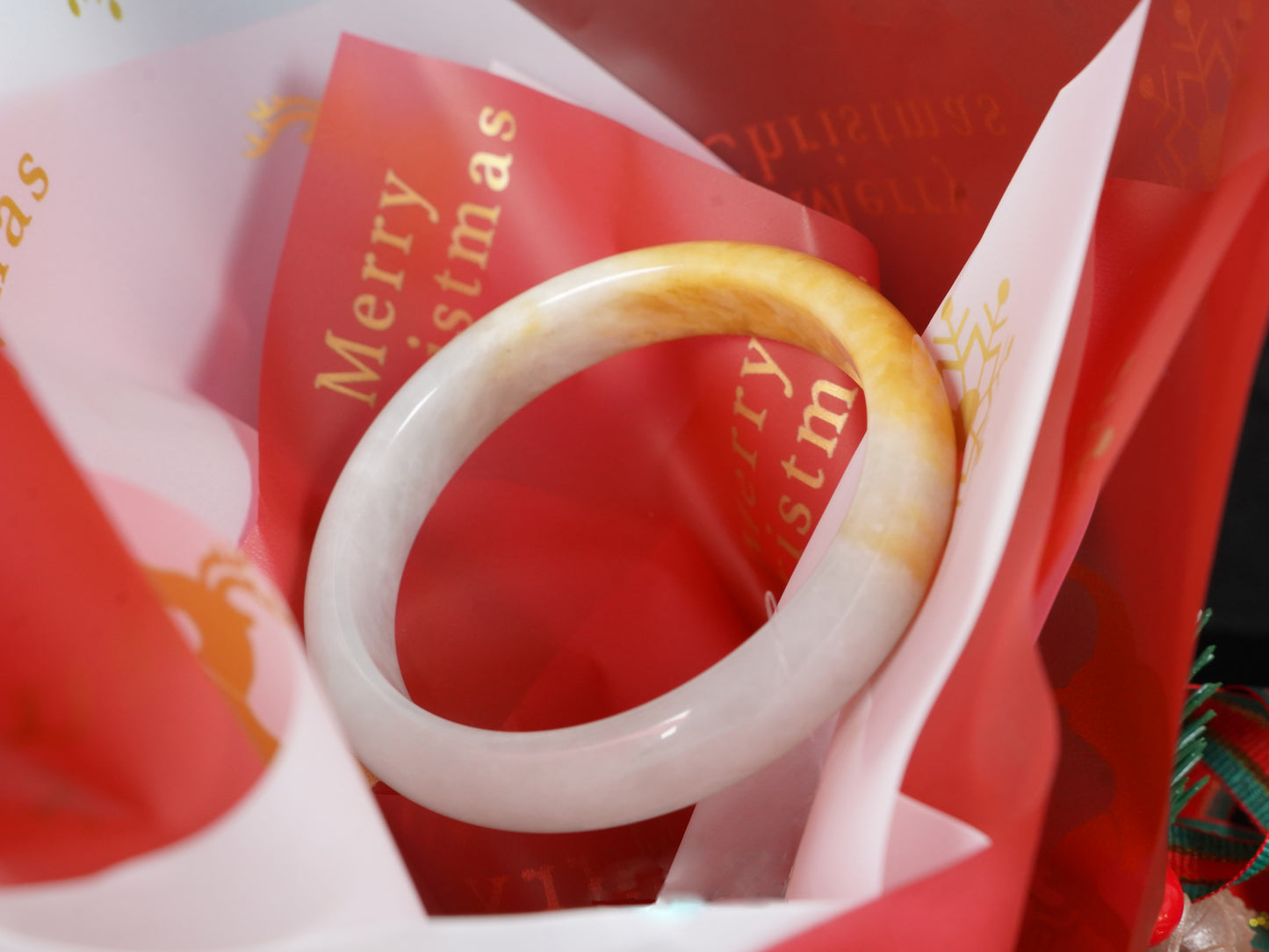 A ivory base with warm amber accent  jadeite bangle.