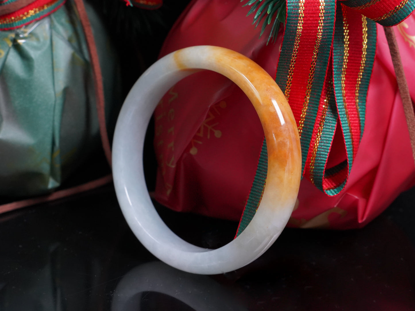 A ivory base with warm amber accent  jadeite bangle.