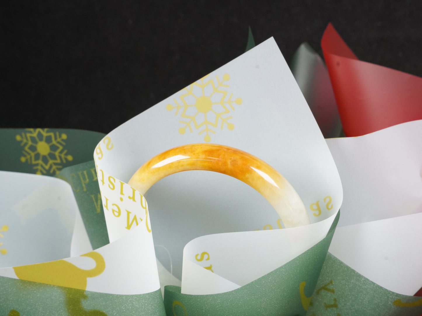 A ivory base with warm amber accent  jadeite bangle.