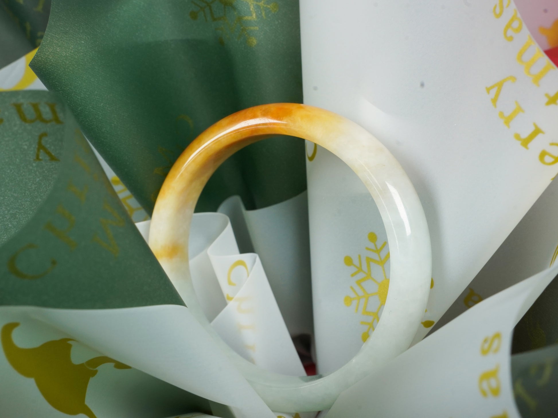 A ivory base with warm amber accent  jadeite bangle.