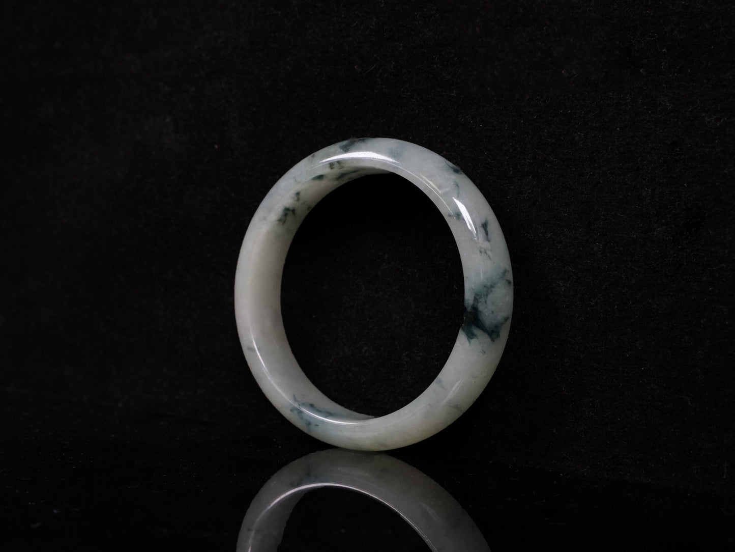 A misty teal veins jadeite bangle.