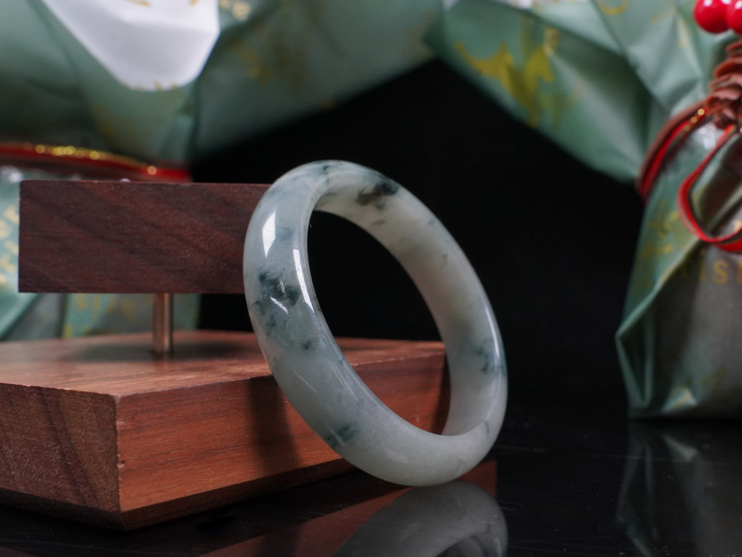 A misty teal veins jadeite bangle.