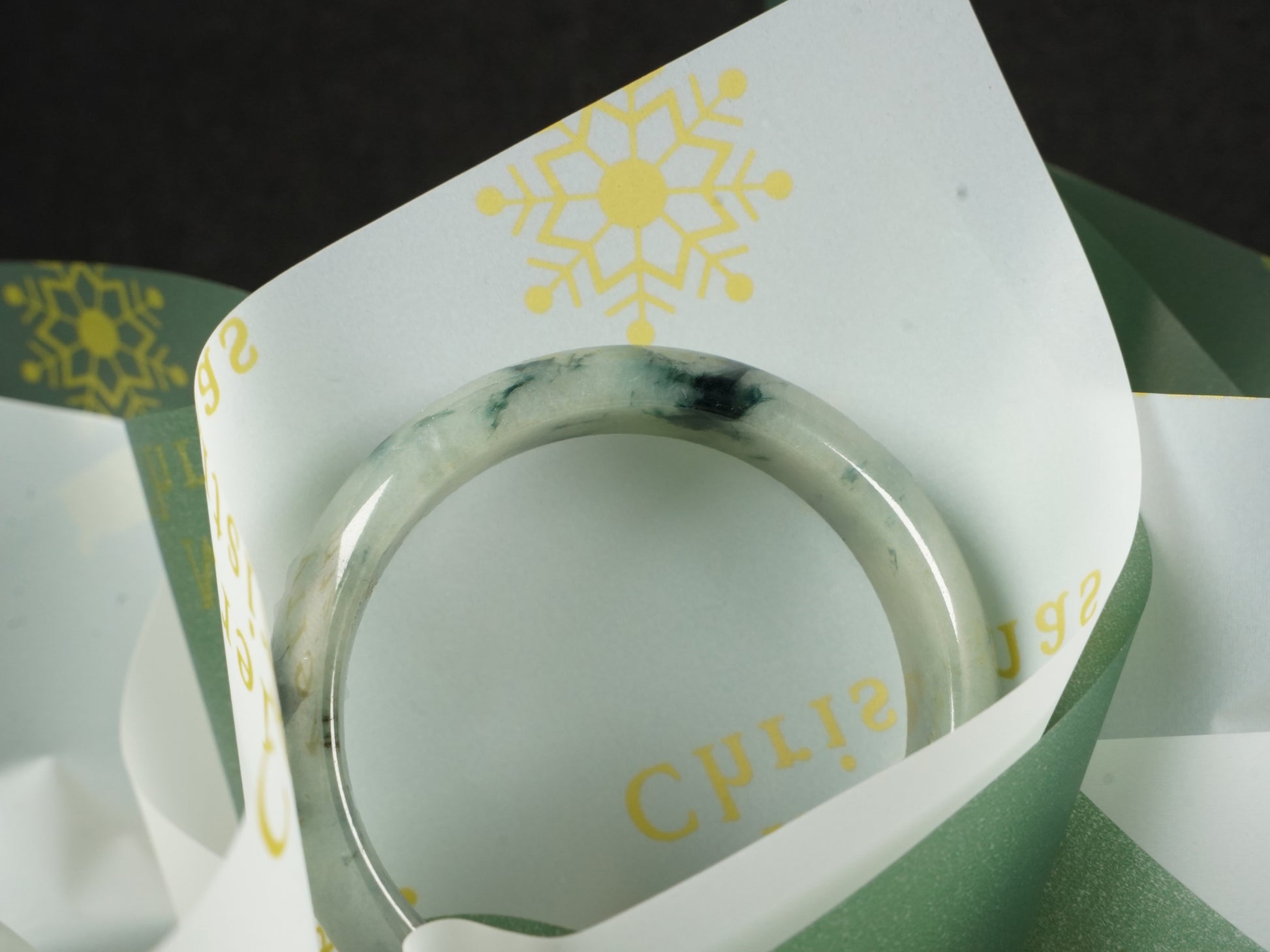 A misty teal veins jadeite bangle.
