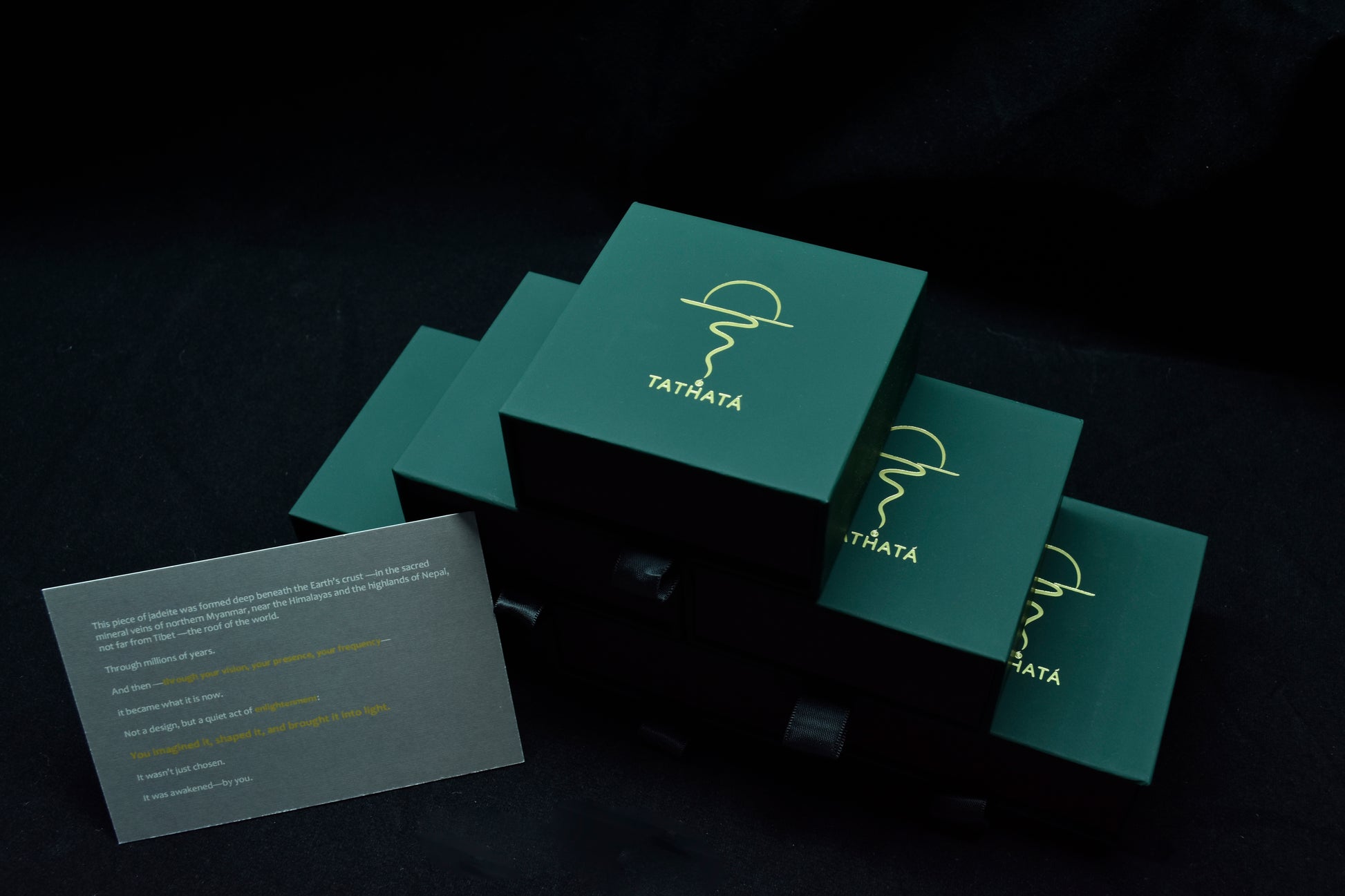 Green boxes with a logo and text on a dark background