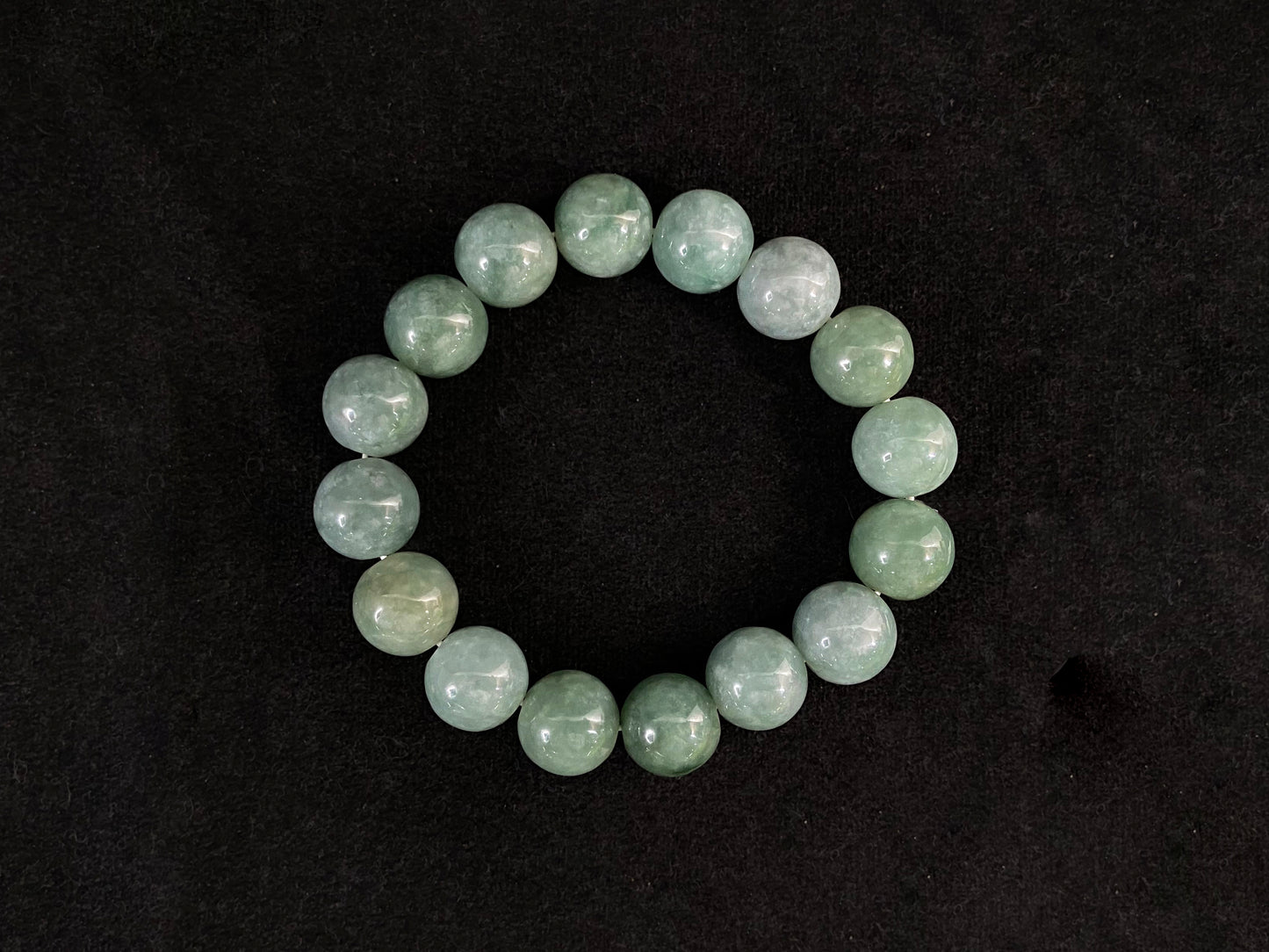 This jadeite bead strand consists entirely of white green beads.