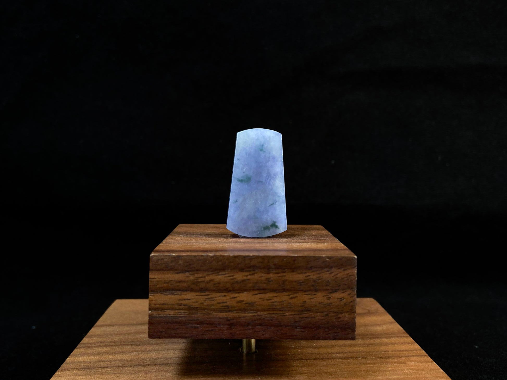 Lavender jade Wu Shi Pai with mossy green patterns.