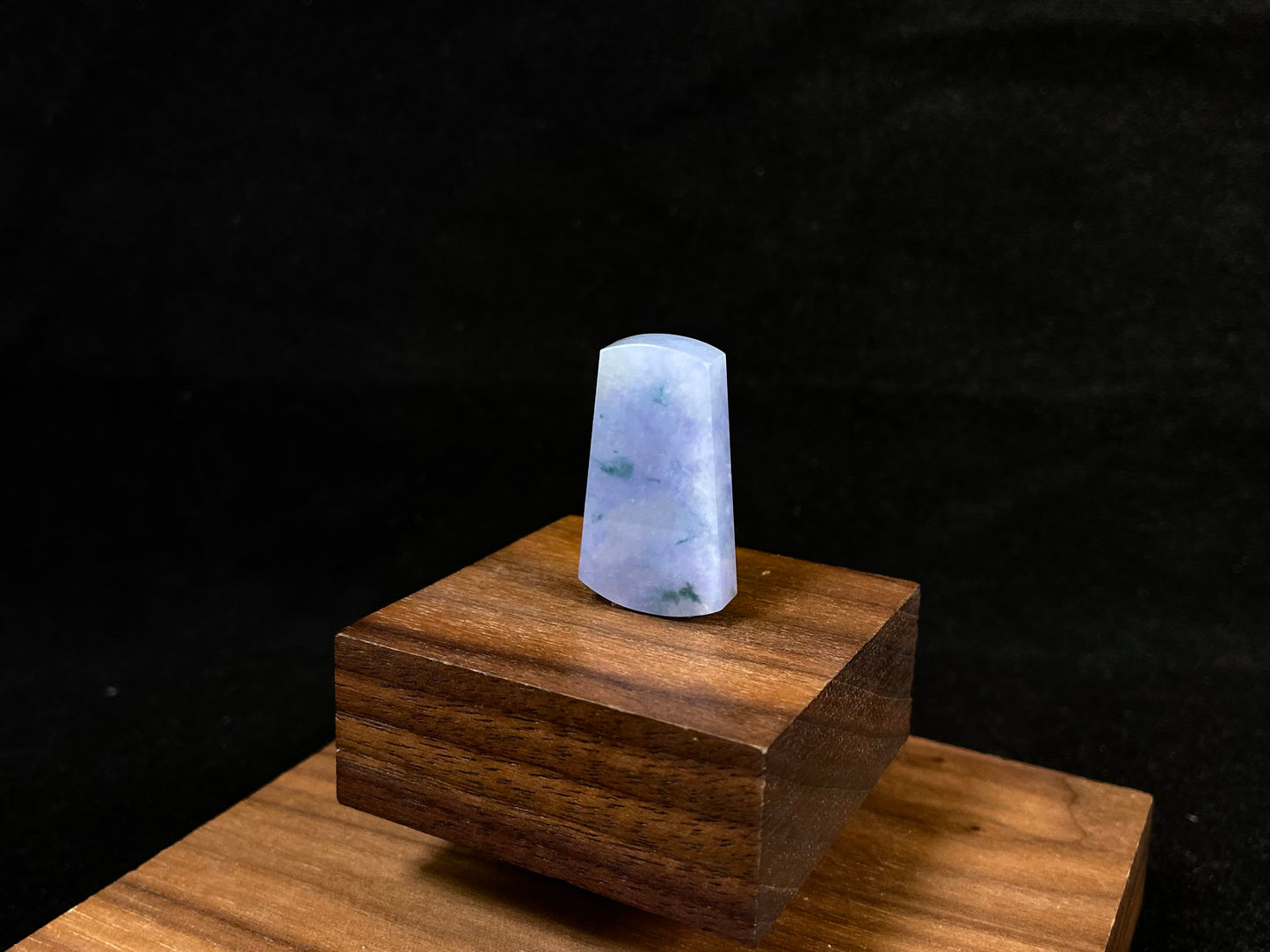 Lavender jade Wu Shi Pai with mossy green patterns.