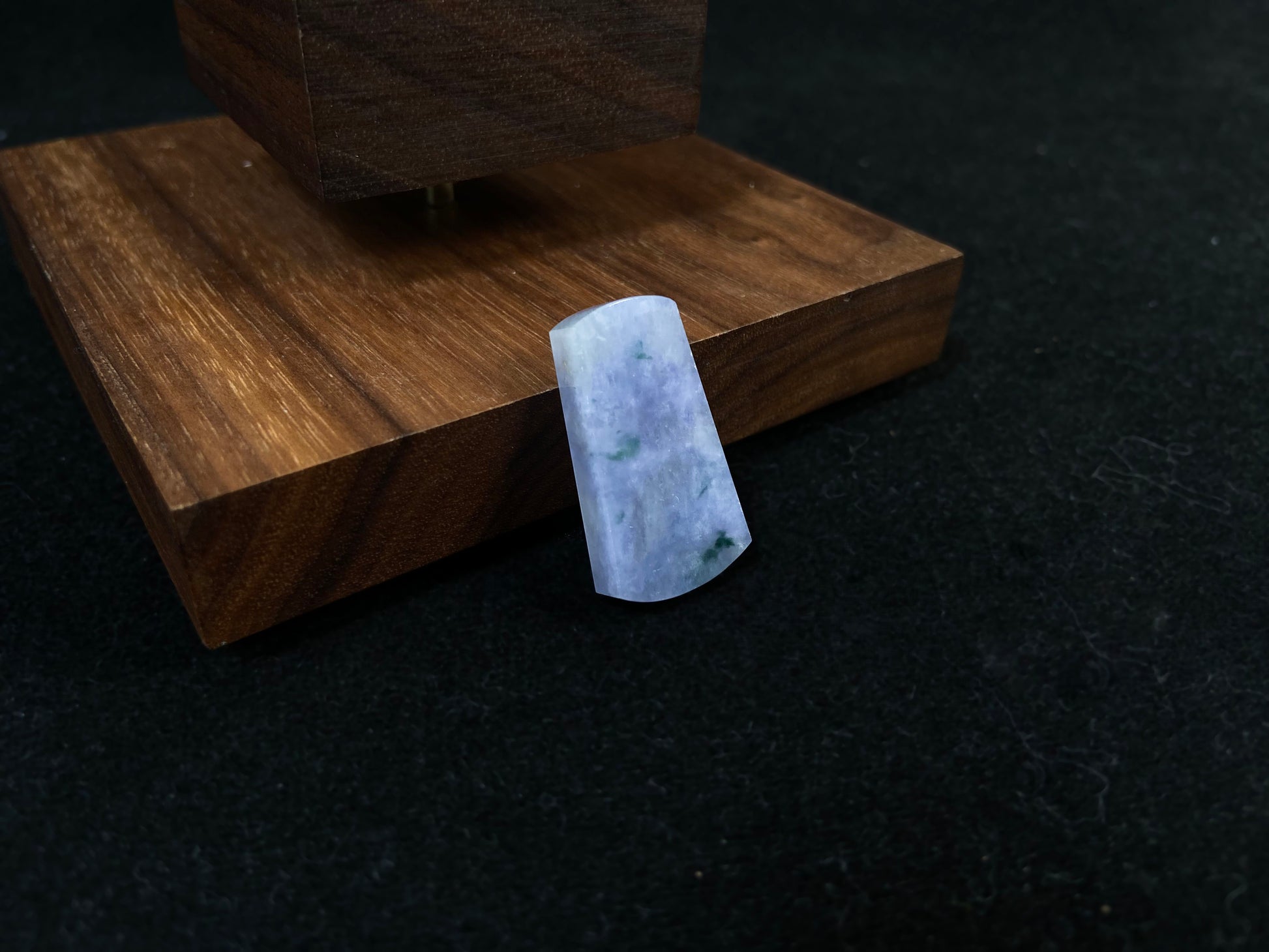 Lavender jade Wu Shi Pai with mossy green patterns.