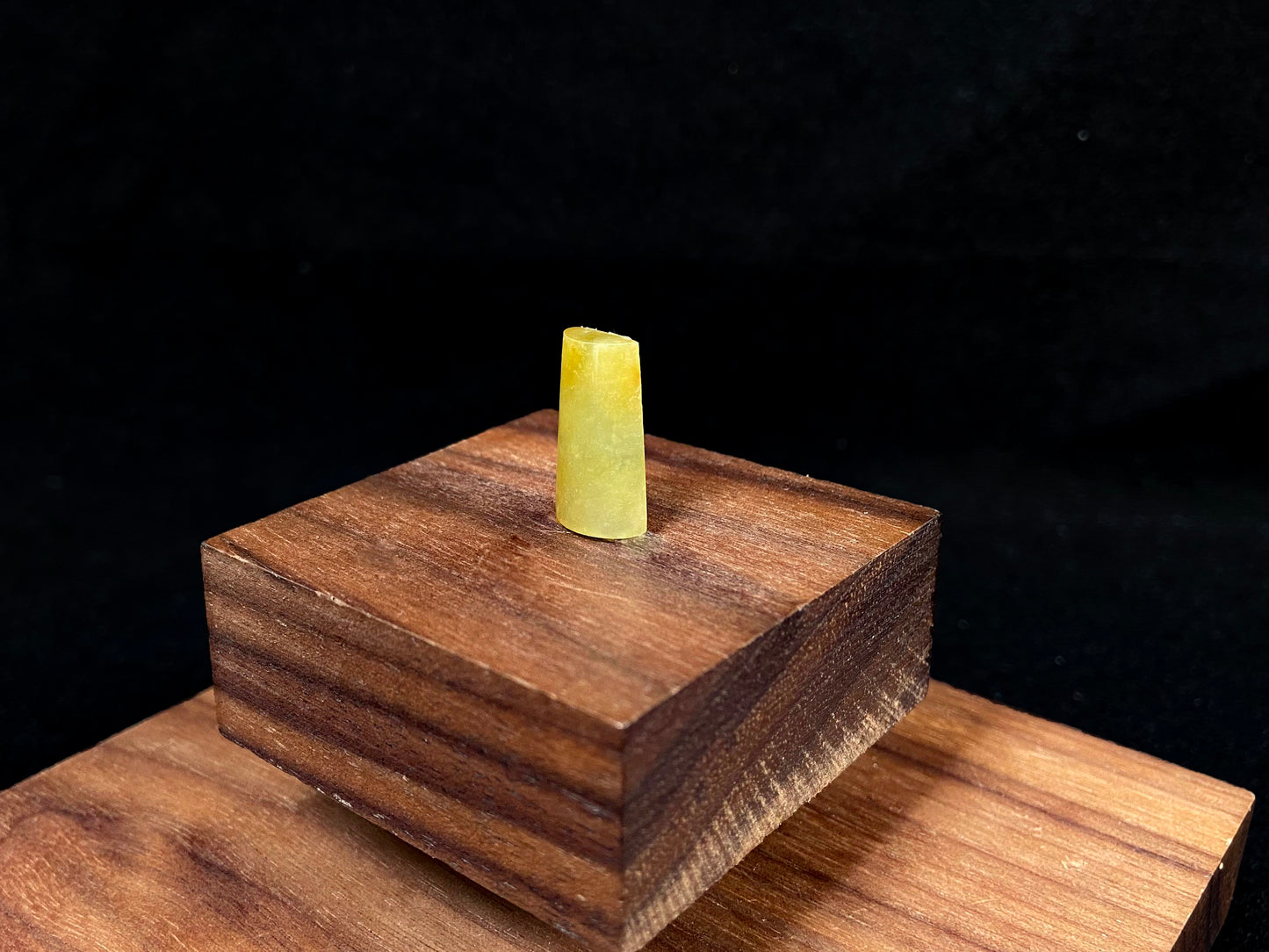 This honey colored jade features a half round shape.