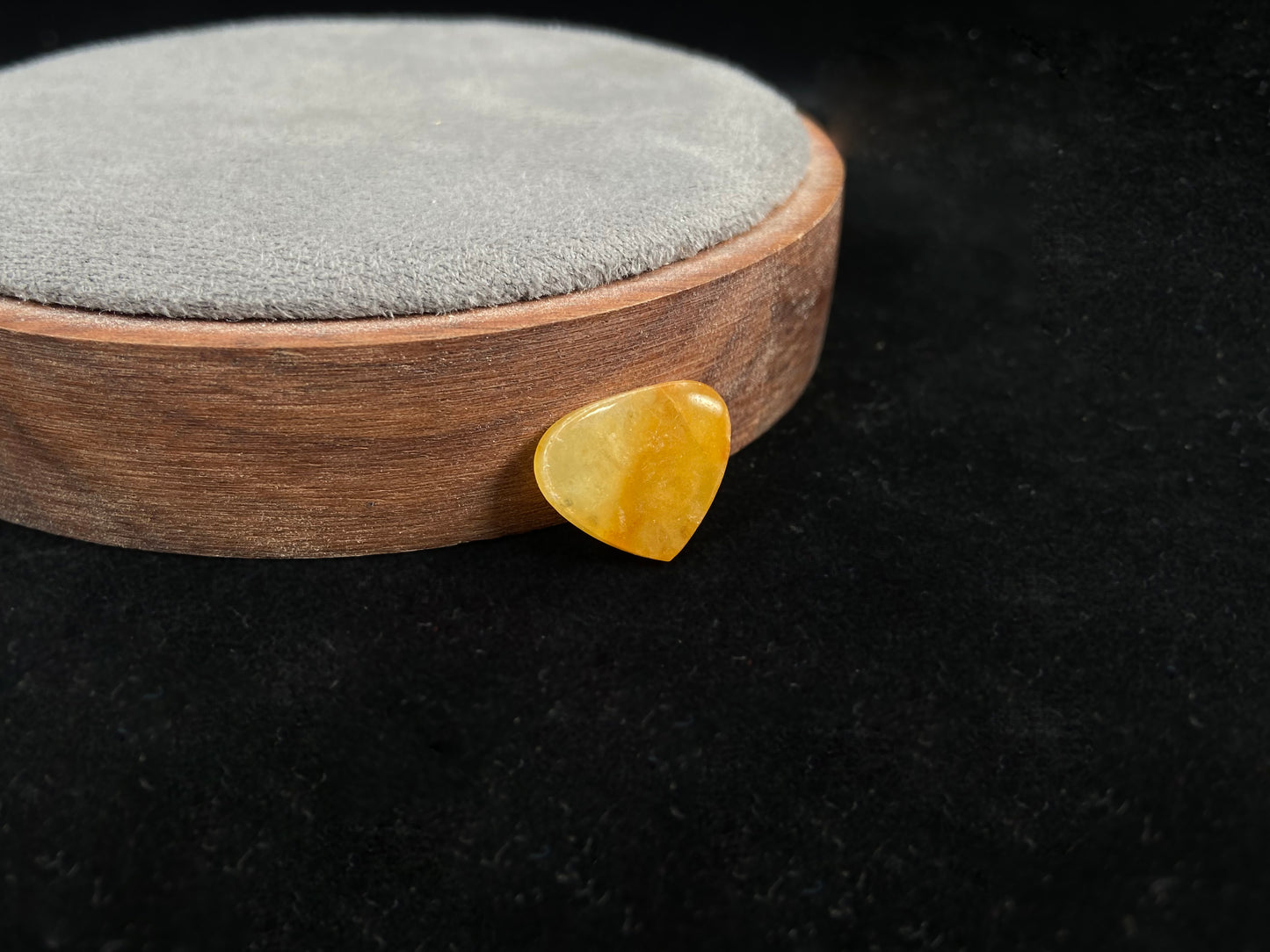 A yellow heart-shaped jadeite.