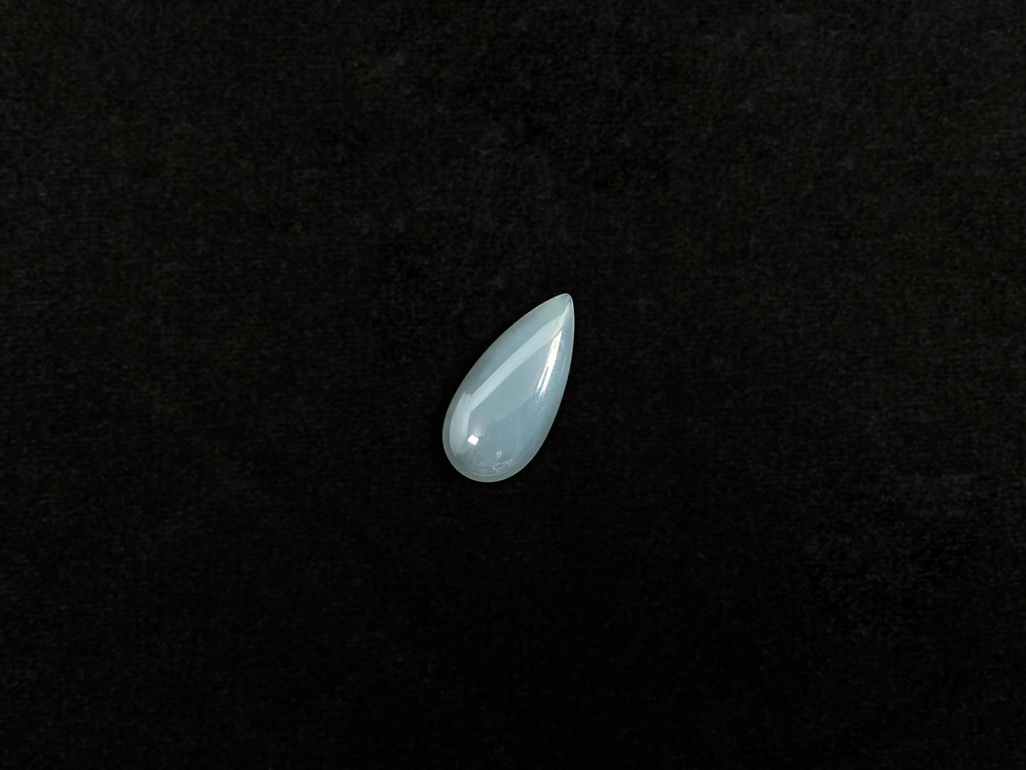 A blue, semi-transparent teardrop jadeite.
