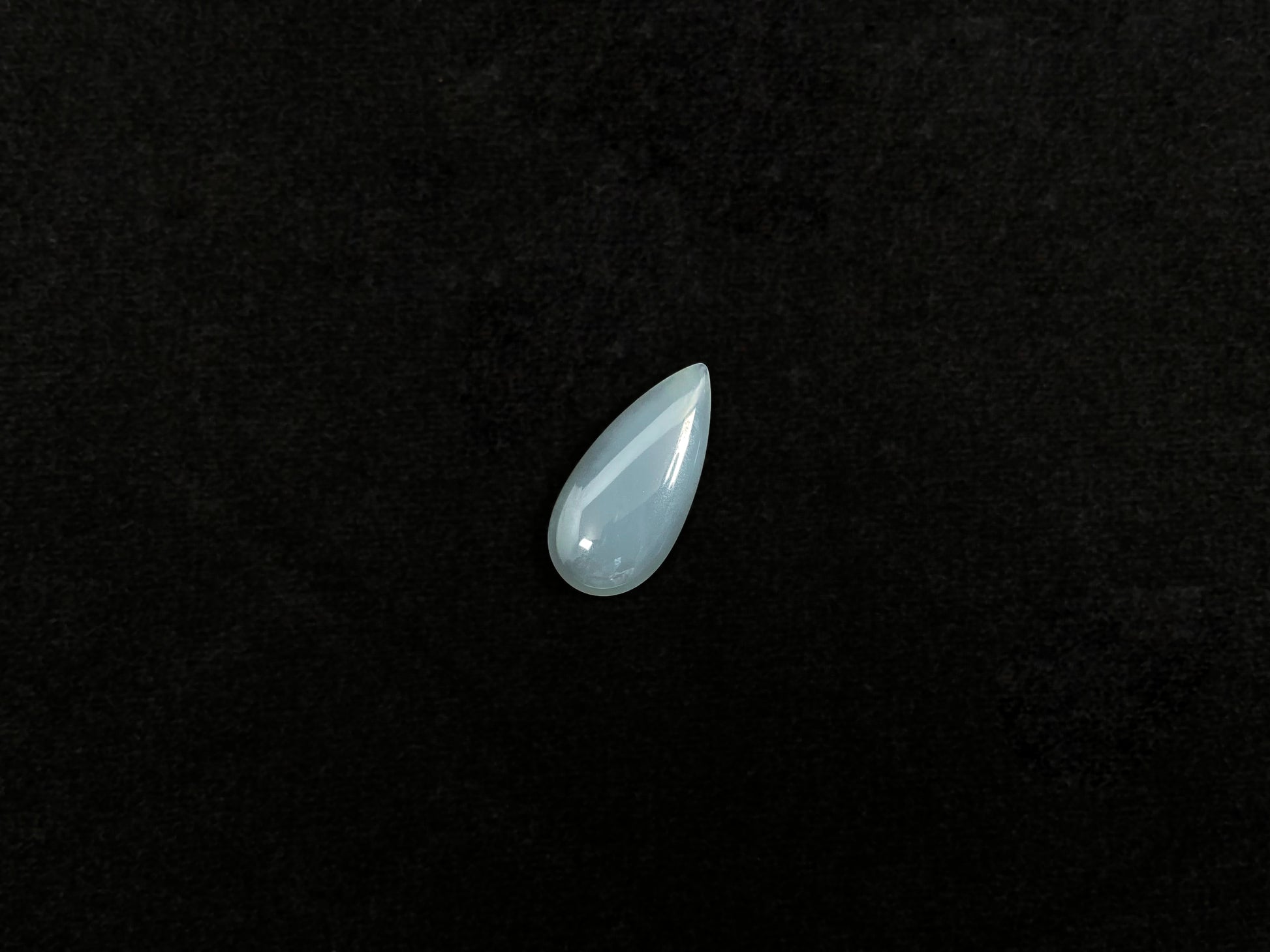 A blue, semi-transparent teardrop jadeite.
