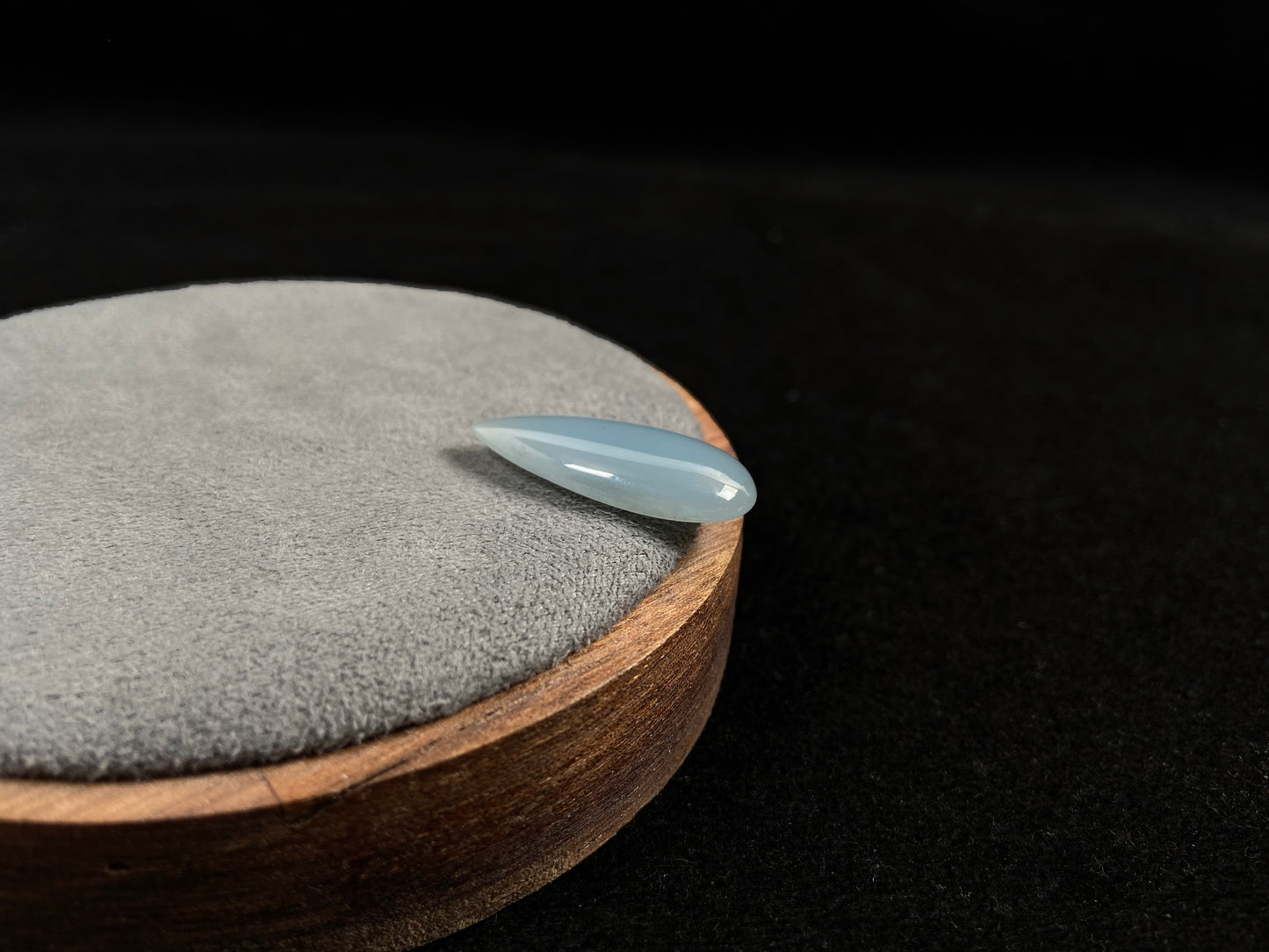 A blue, semi-transparent teardrop jadeite.
