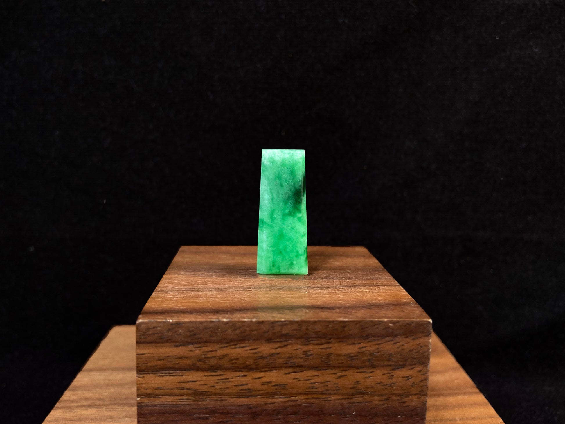 This Wu Shi Pai features a light white green background with deep green markings.