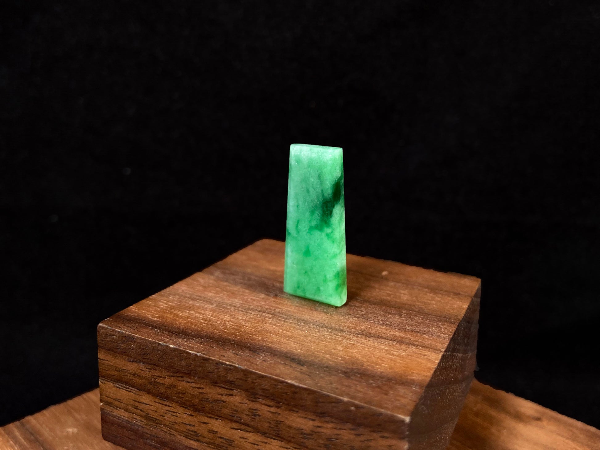 This Wu Shi Pai features a light white green background with deep green markings.