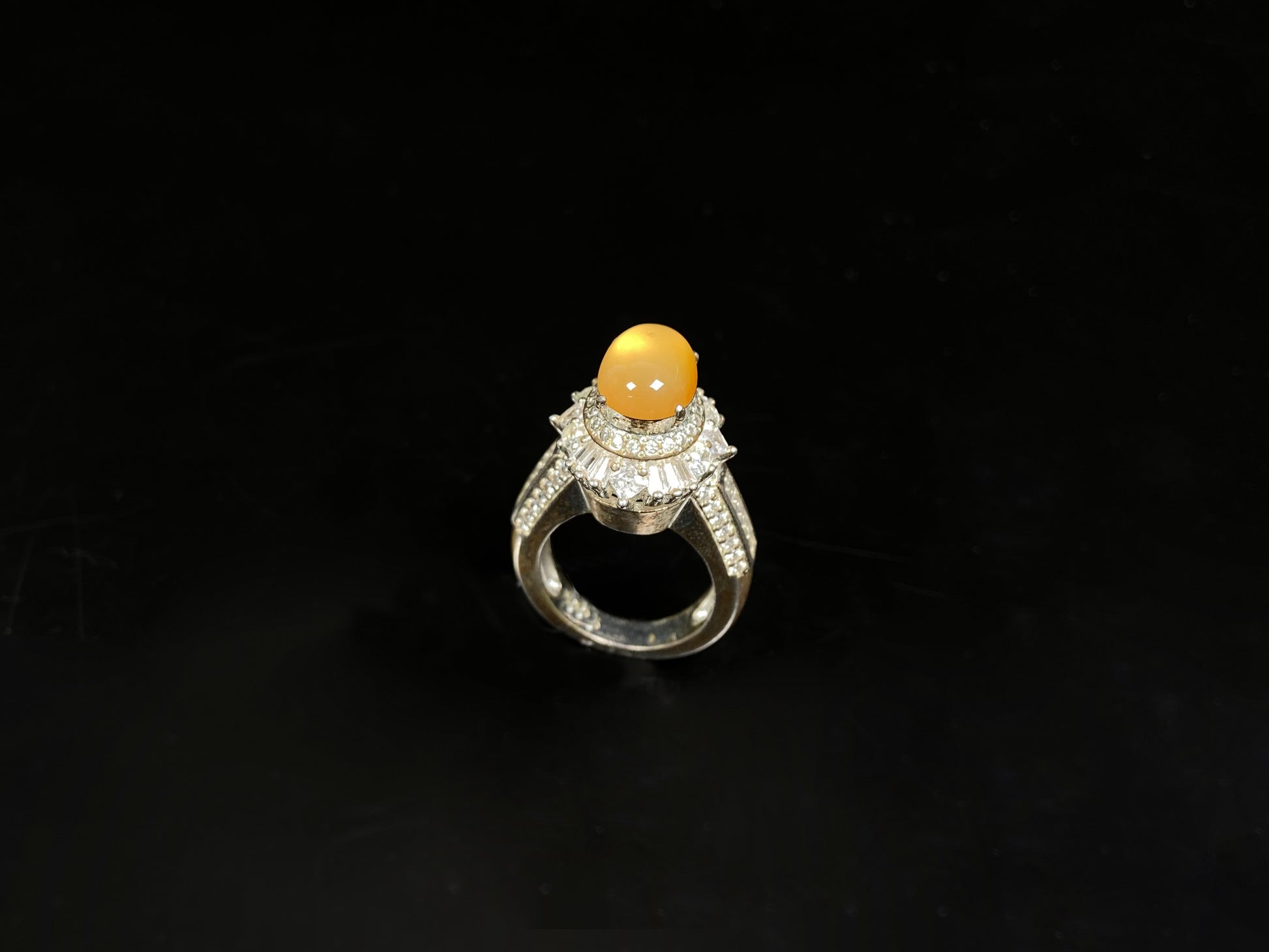 A warm imperial amber jadeite ring.