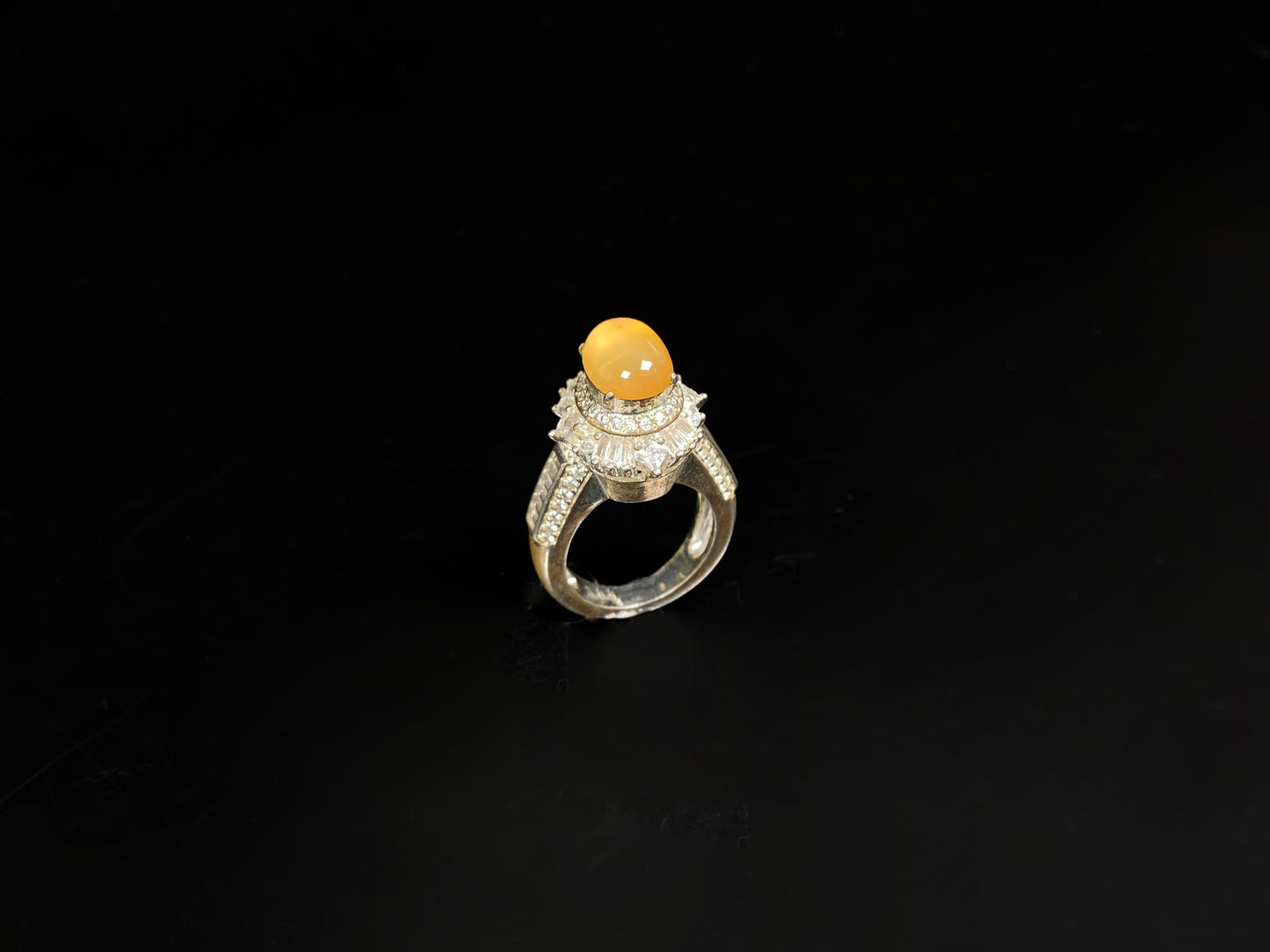 A warm imperial amber jadeite ring.