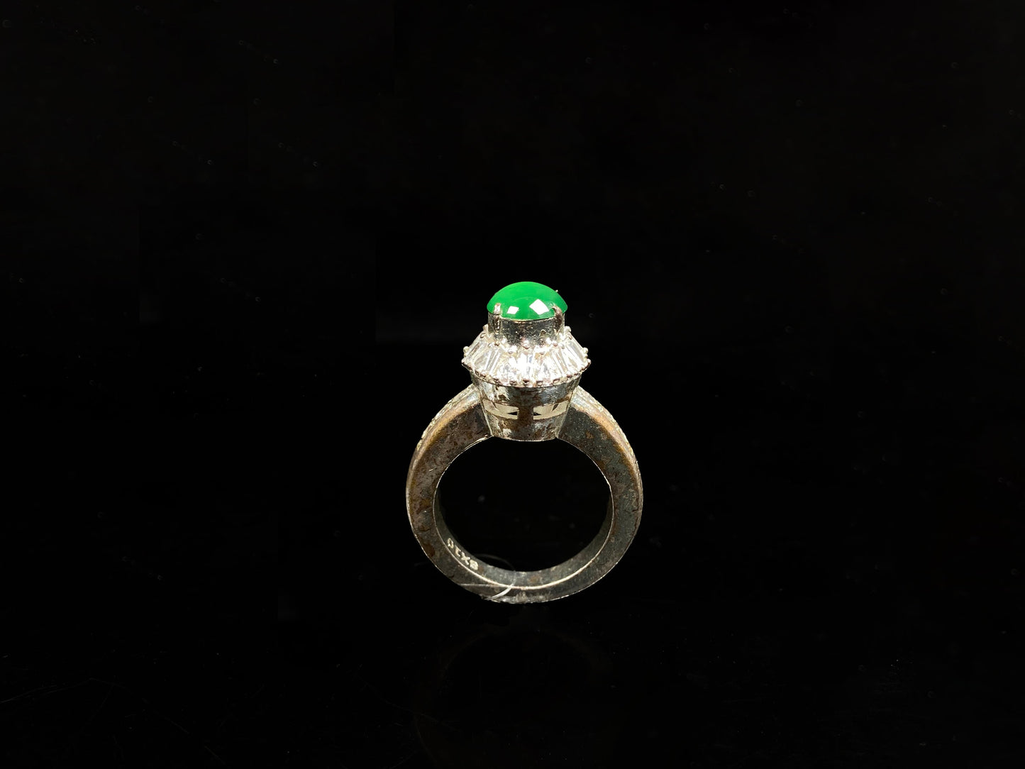 A enchanting imperial green jadeite ring.