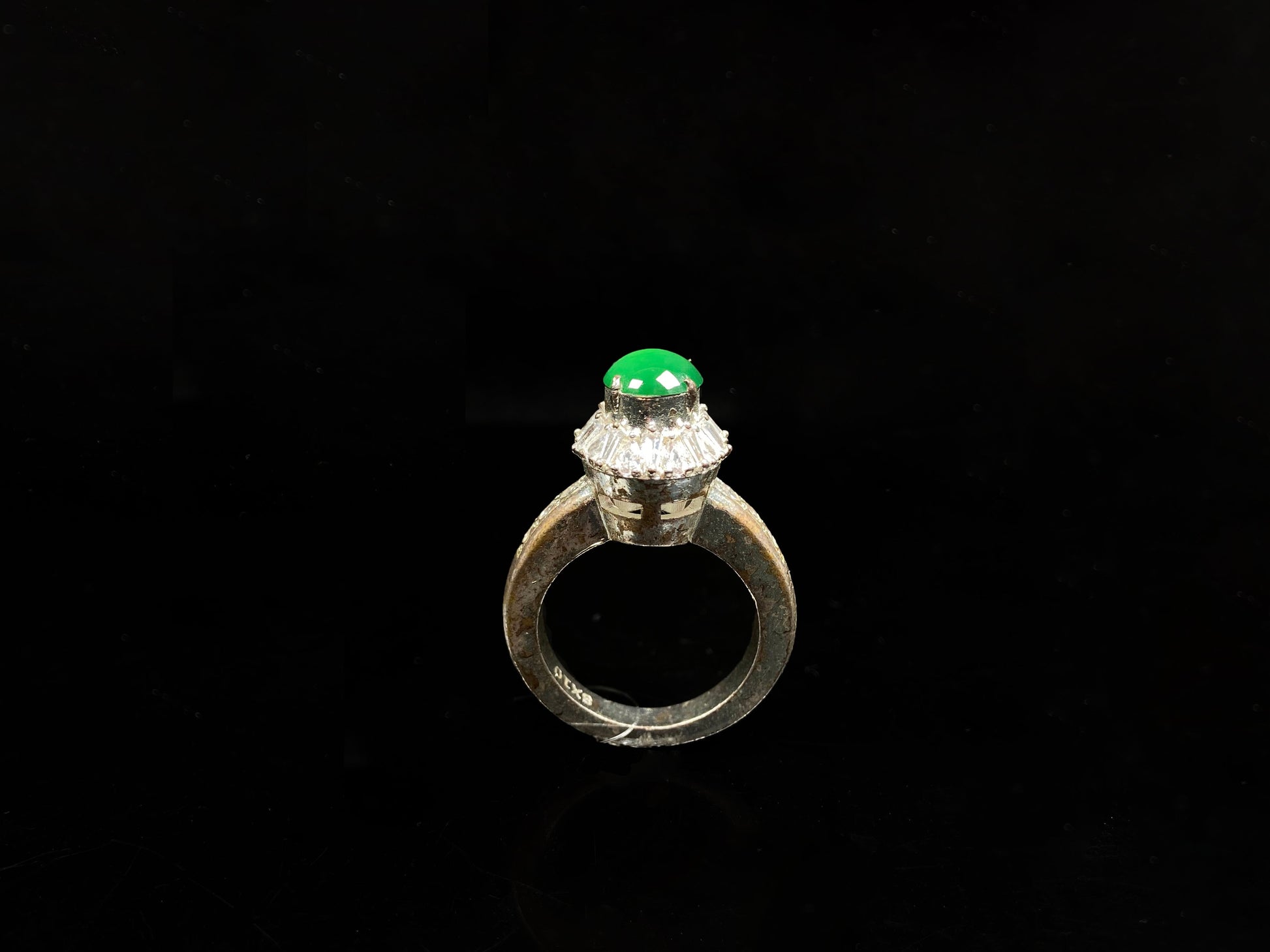 A enchanting imperial green jadeite ring.